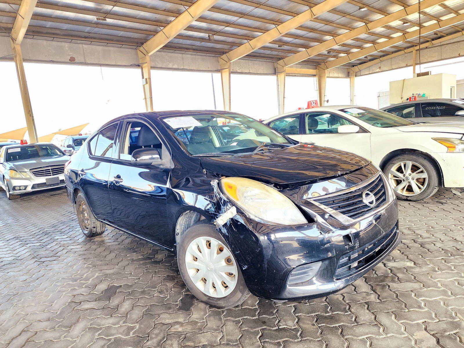 2014 NISSAN VERSA — 129131 Miles — Lot 64651 — Souq - Marhaba Auctions Used Cars - Image 5