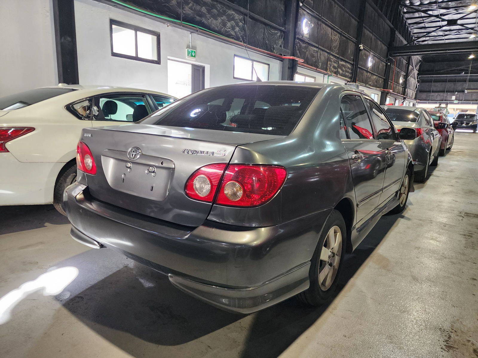 2006 TOYOTA COROLLA — 182359 Miles — Lot E66Z761492 — Al Quoz - Marhaba Auctions Used Cars - Image 4