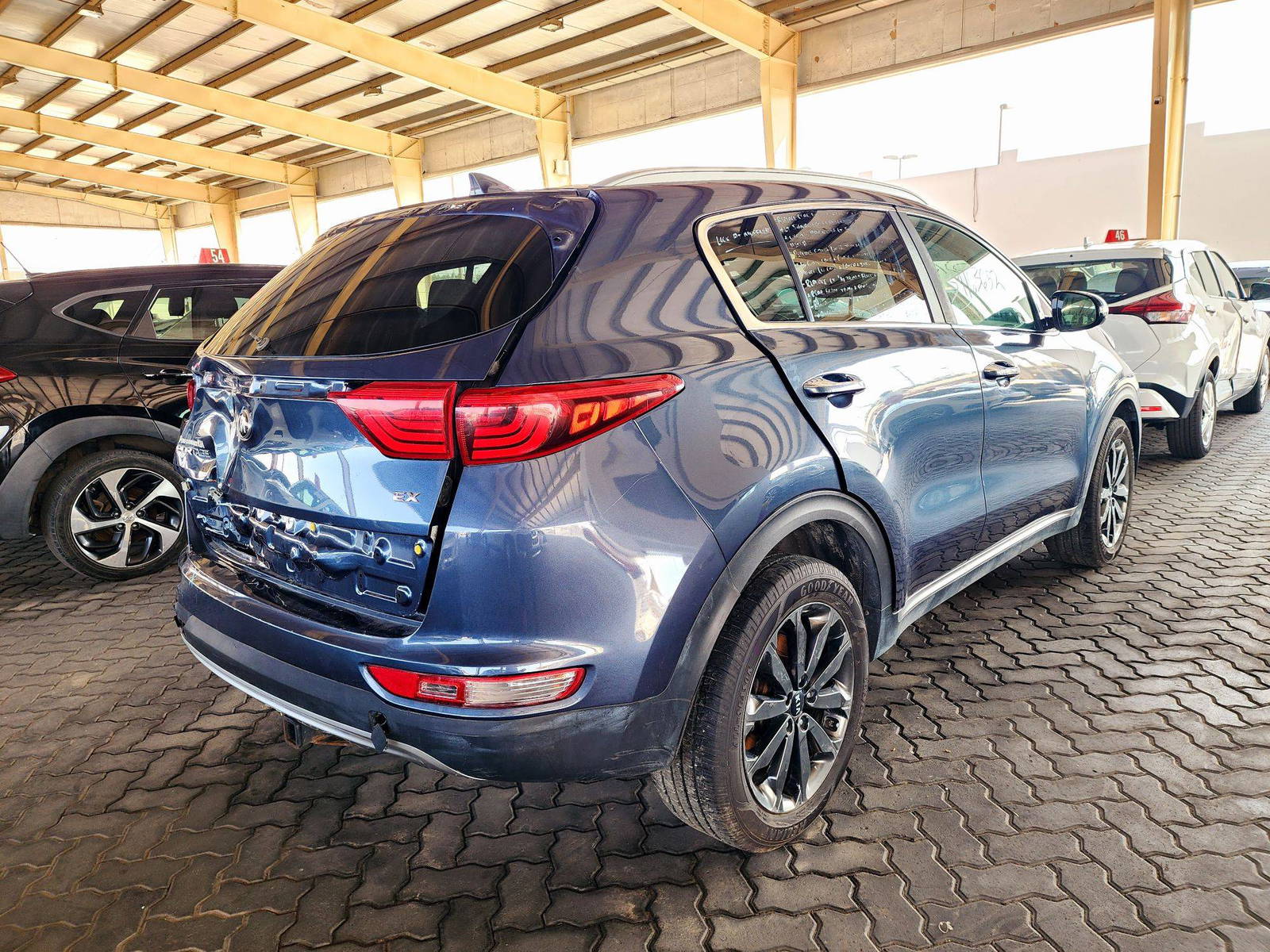 2019 KIA SPORTAGE — 121465 Miles — Lot XK7607 — Souq - Marhaba Auctions Used Cars - Image 4