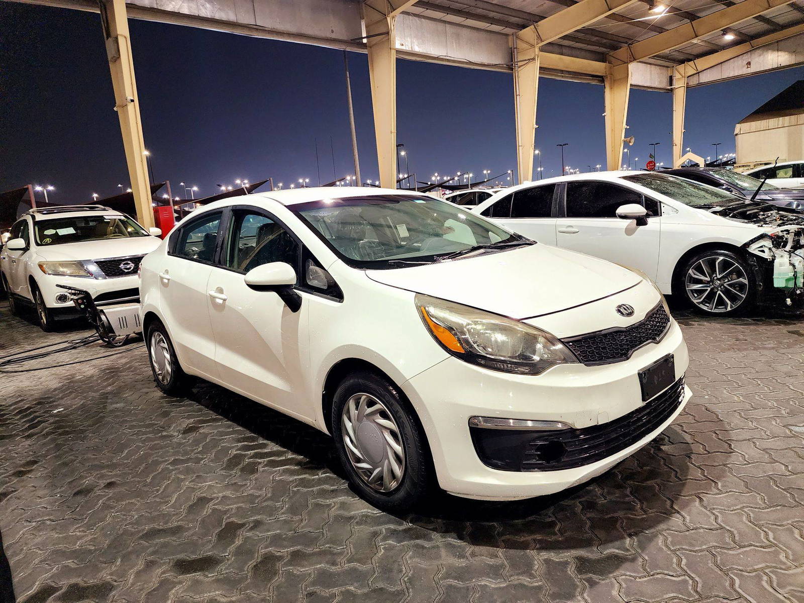 2017 KIA RIO — 149477 Miles — Lot 4A34H6016116 — Souq - Marhaba Auctions Used Cars - Image 4