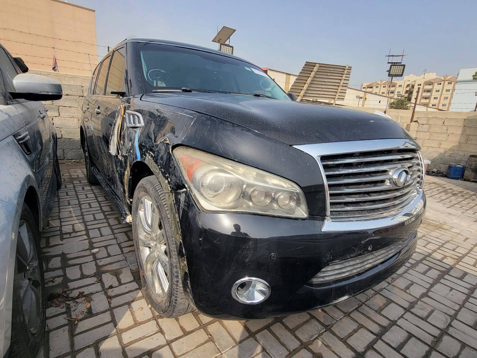 2014 INFINITI QX80 — 193339 Miles — Lot E9063004 — Main - Marhaba Auctions Used Cars - Image 10