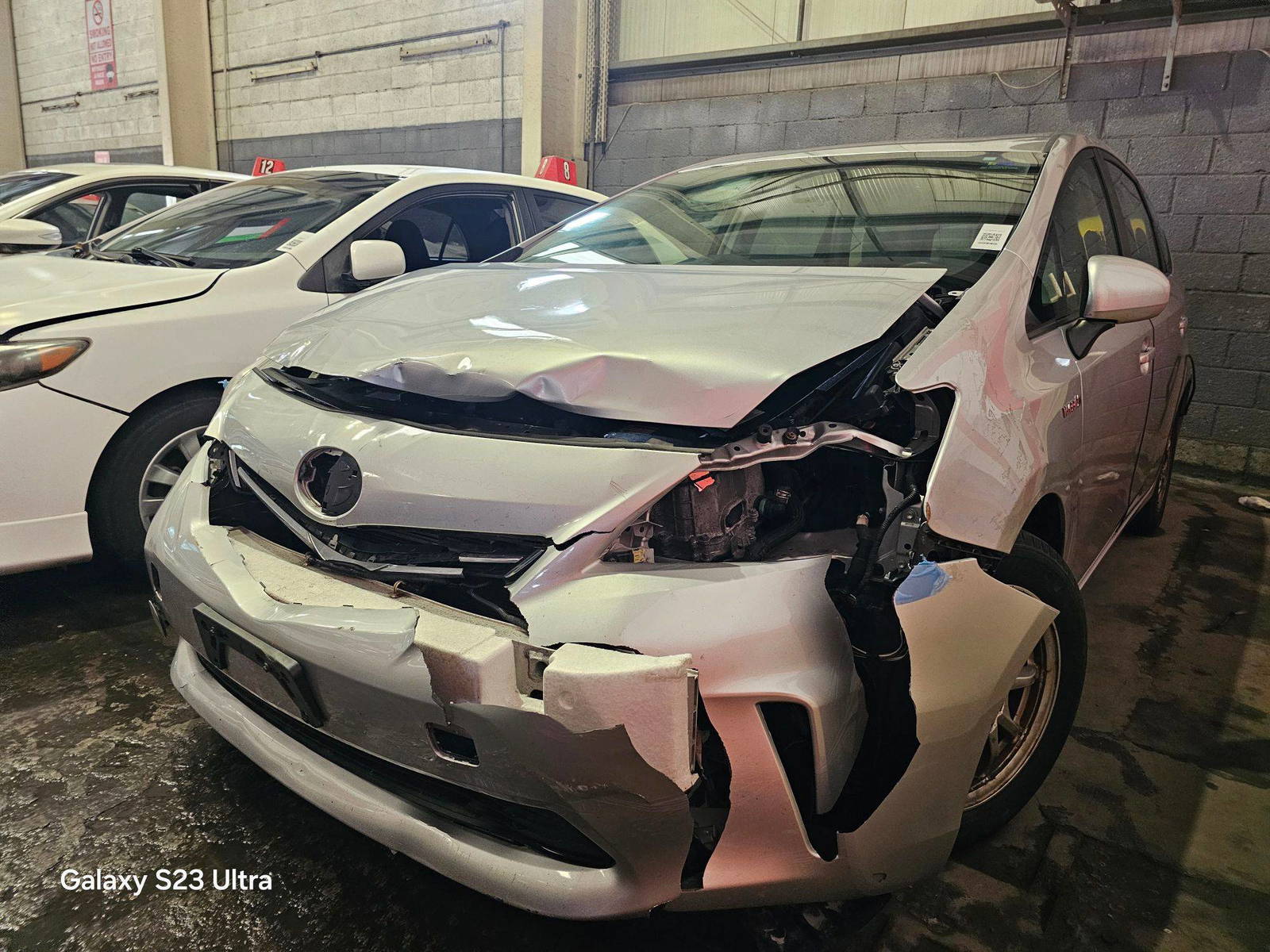2012 TOYOTA PRIUS V — 174767 Miles — Lot 89634835 — Main - Marhaba Auctions Used Cars - Image 4