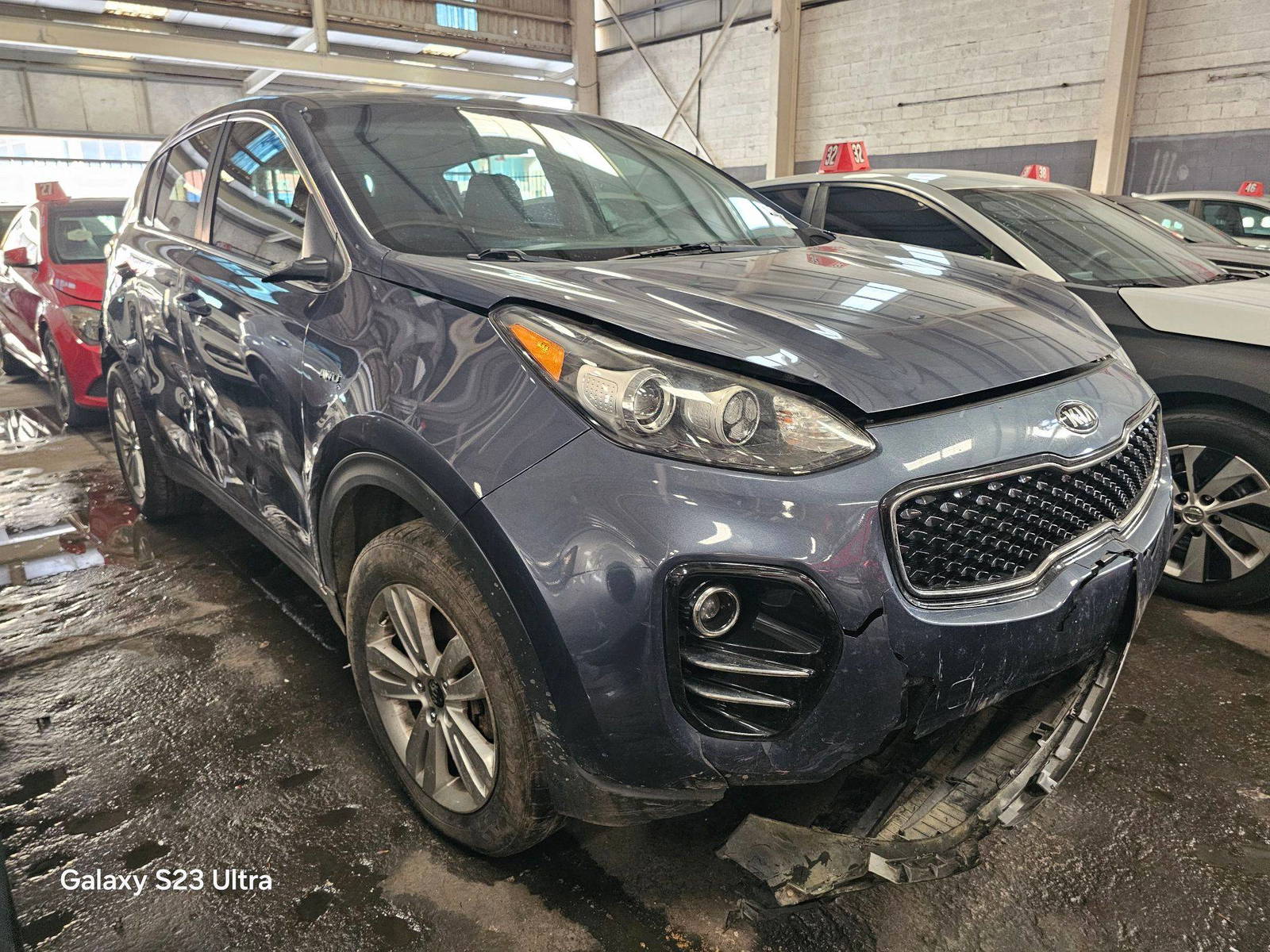 2019 KIA SPORTAGE — 158292 Miles — Lot 43871726 — Main - Marhaba Auctions Used Cars - Image 4