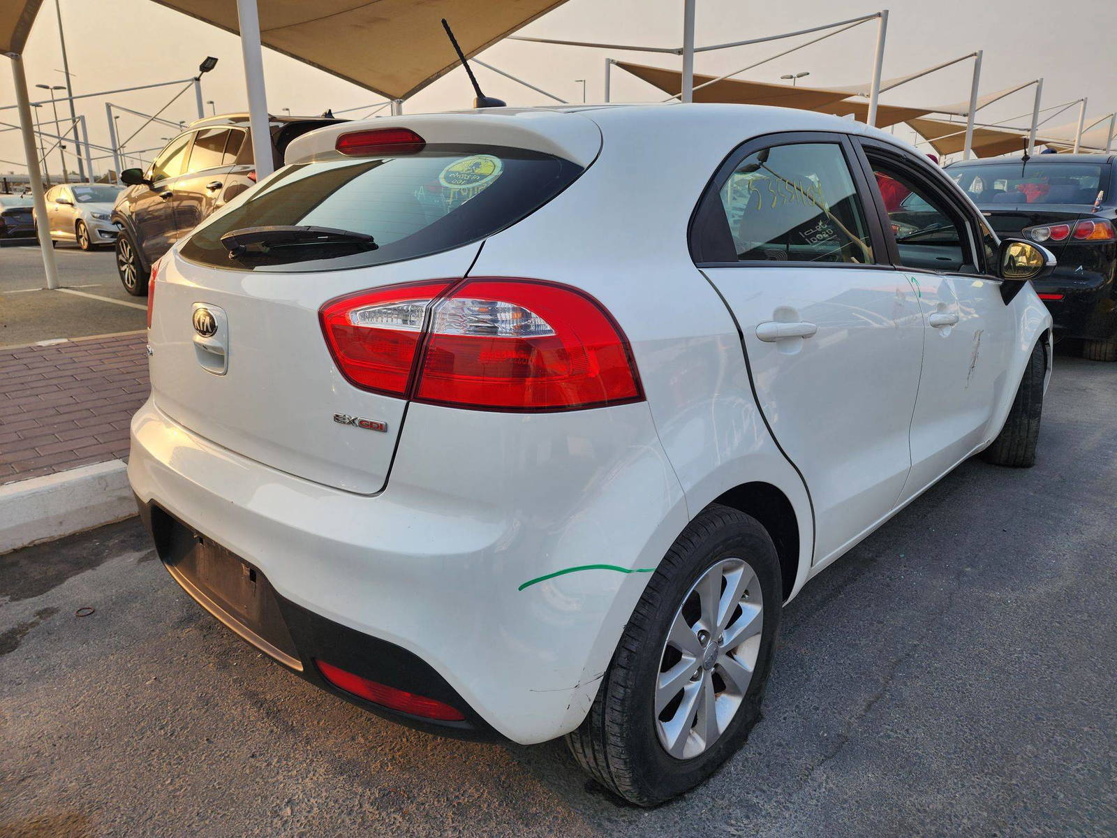 2013 KIA RIO — 118871 Miles — Lot 12945 — Souq - Marhaba Auctions Used Cars - Image 3
