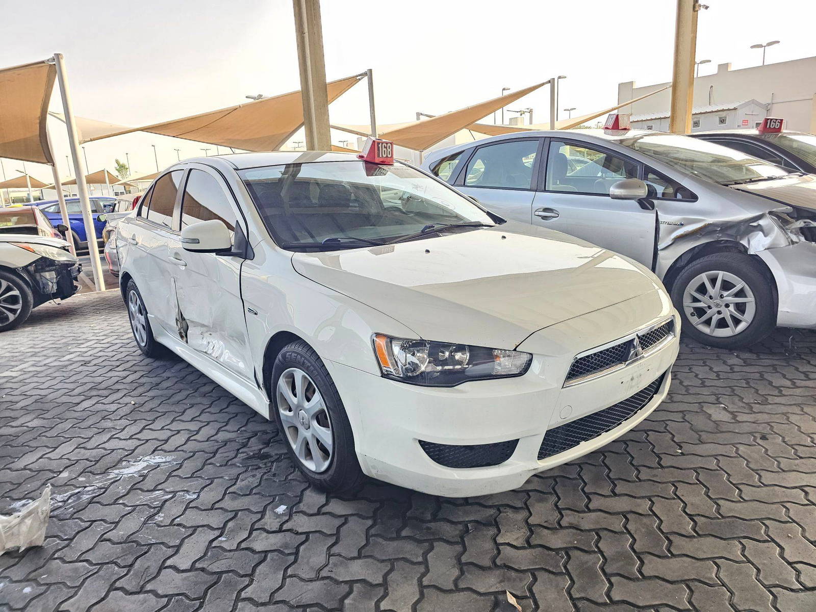 2015 MITSUBISHI LANCER — 169115 Miles — Lot 42883569 — Main - Marhaba Auctions Used Cars - Image 3