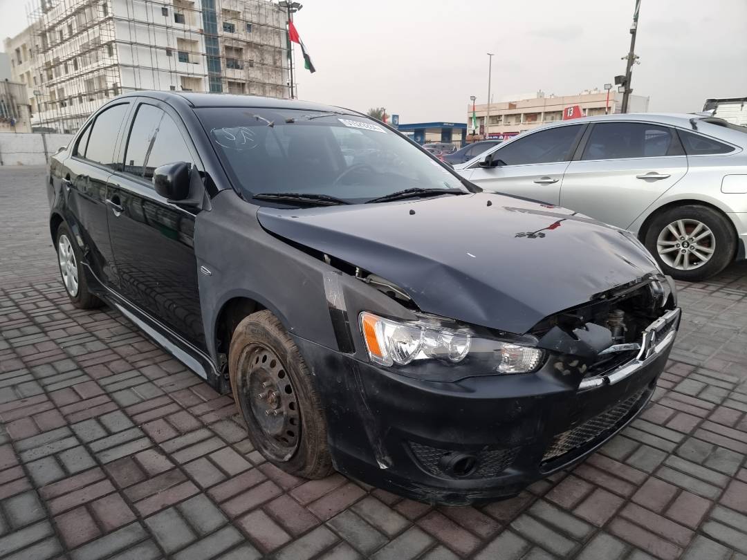 2015 MITSUBISHI LANCER — 136591 Miles — Lot 214587 — Ind. 12 - Marhaba Auctions Used Cars - Image 4