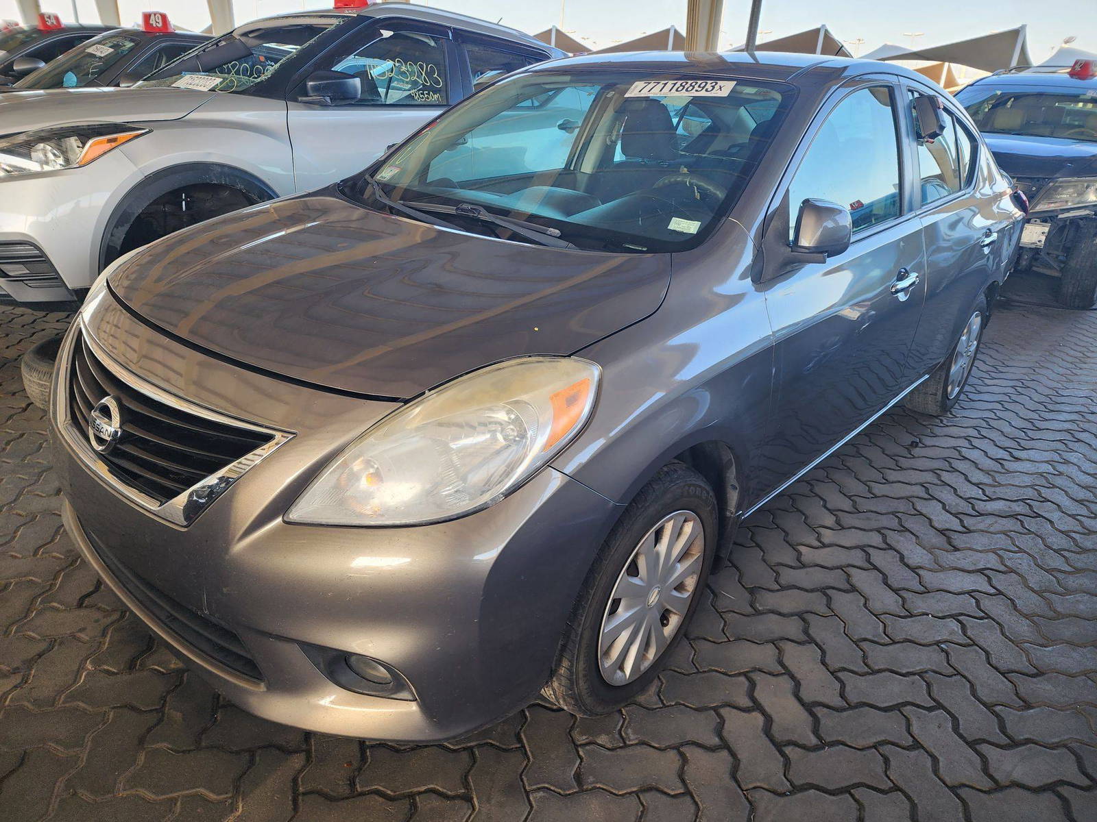 2012 NISSAN VERSA — 156050 Miles — Lot 77118893 - Marhaba Auctions Used Cars - Image 7