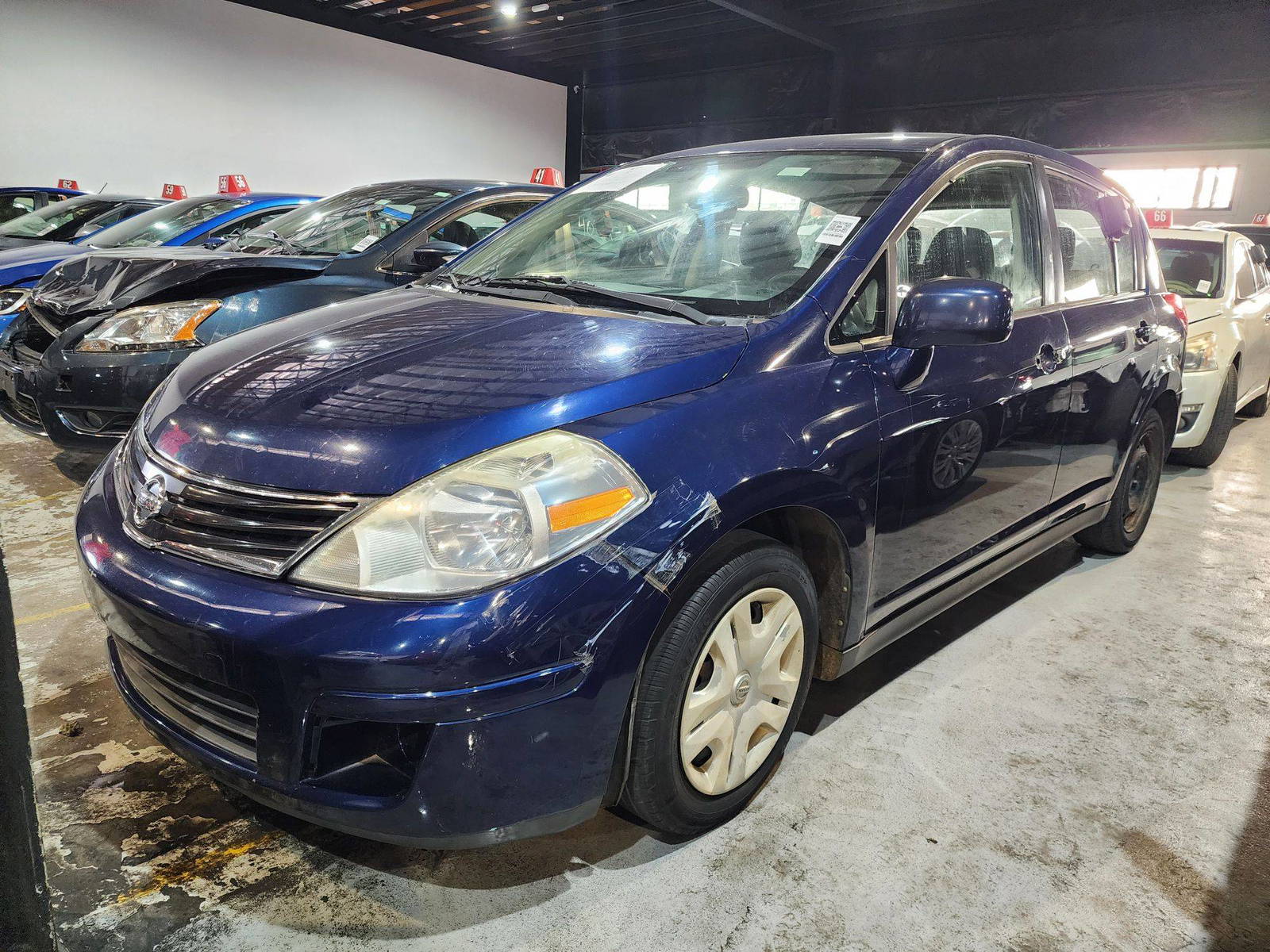 2012 NISSAN VERSA — 263304 Miles — Lot 40626024 — Al Quoz - Marhaba Auctions Used Cars - Image 4