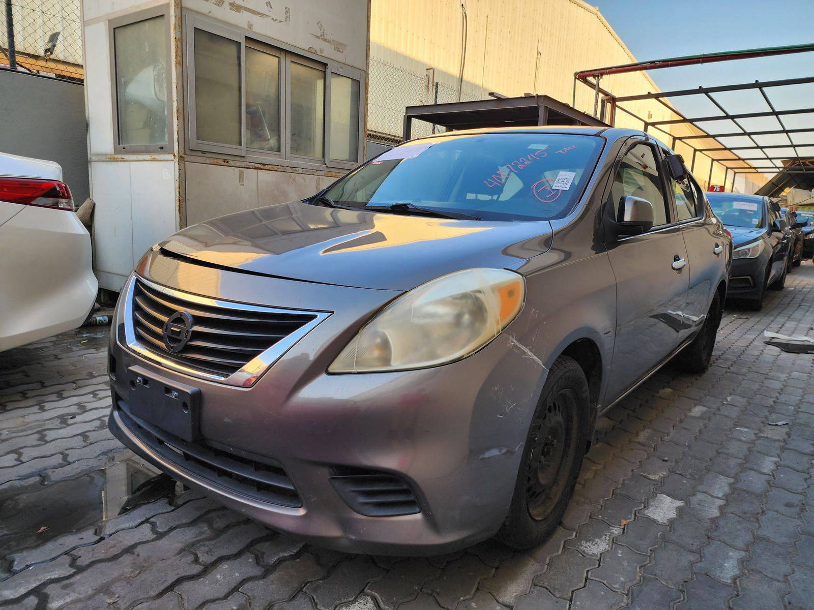 2014 NISSAN VERSA — 153424 Miles — Lot 29093 — Al Quoz - Marhaba Auctions Used Cars - Image 3