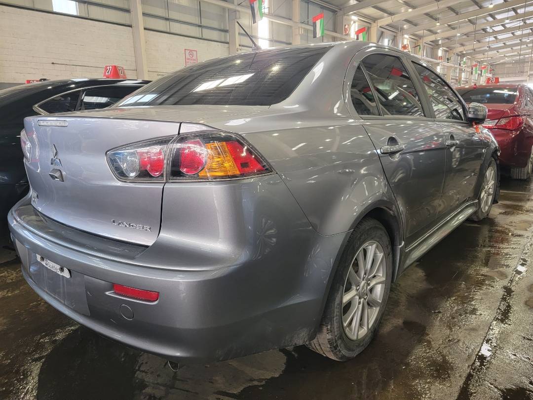 2017 MITSUBISHI LANCER — 115889 KM — Lot 602383 - Marhaba Auctions Used Cars - Image 3