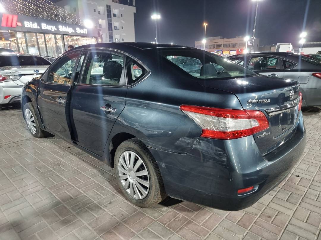 2013 NISSAN SENTRA — 152484 KM — Lot 215487 — Ind. 12 - Marhaba Auctions Used Cars - Image 4