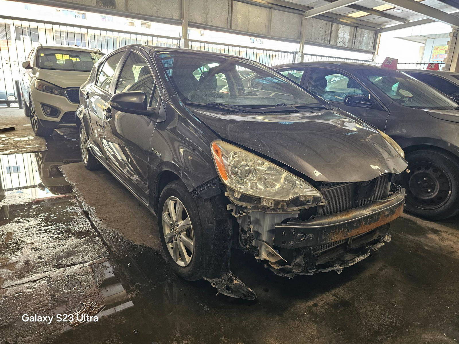2014 TOYOTA PRIUS C — 221387 KM — Lot E1563611 — Main - Marhaba Auctions Used Cars - Image 4