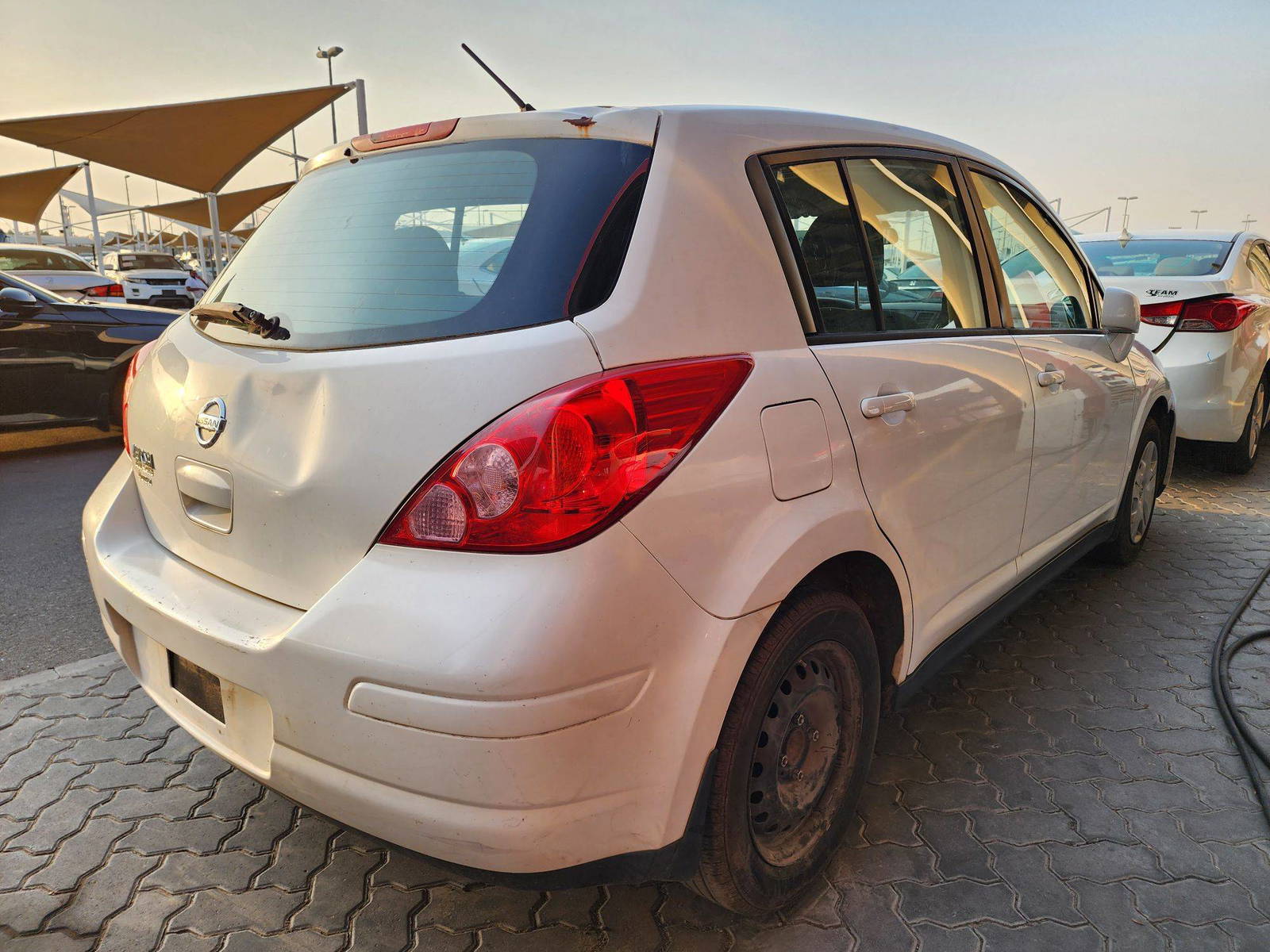 2012 NISSAN VERSA — 181119 Miles — Lot 38696153 — Souq - Marhaba Auctions Used Cars - Image 3