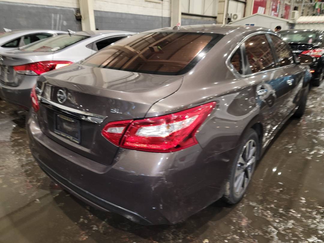 2017 NISSAN ALTIMA — 100673 Miles — Lot 64663033 - Marhaba Auctions Used Cars - Image 4