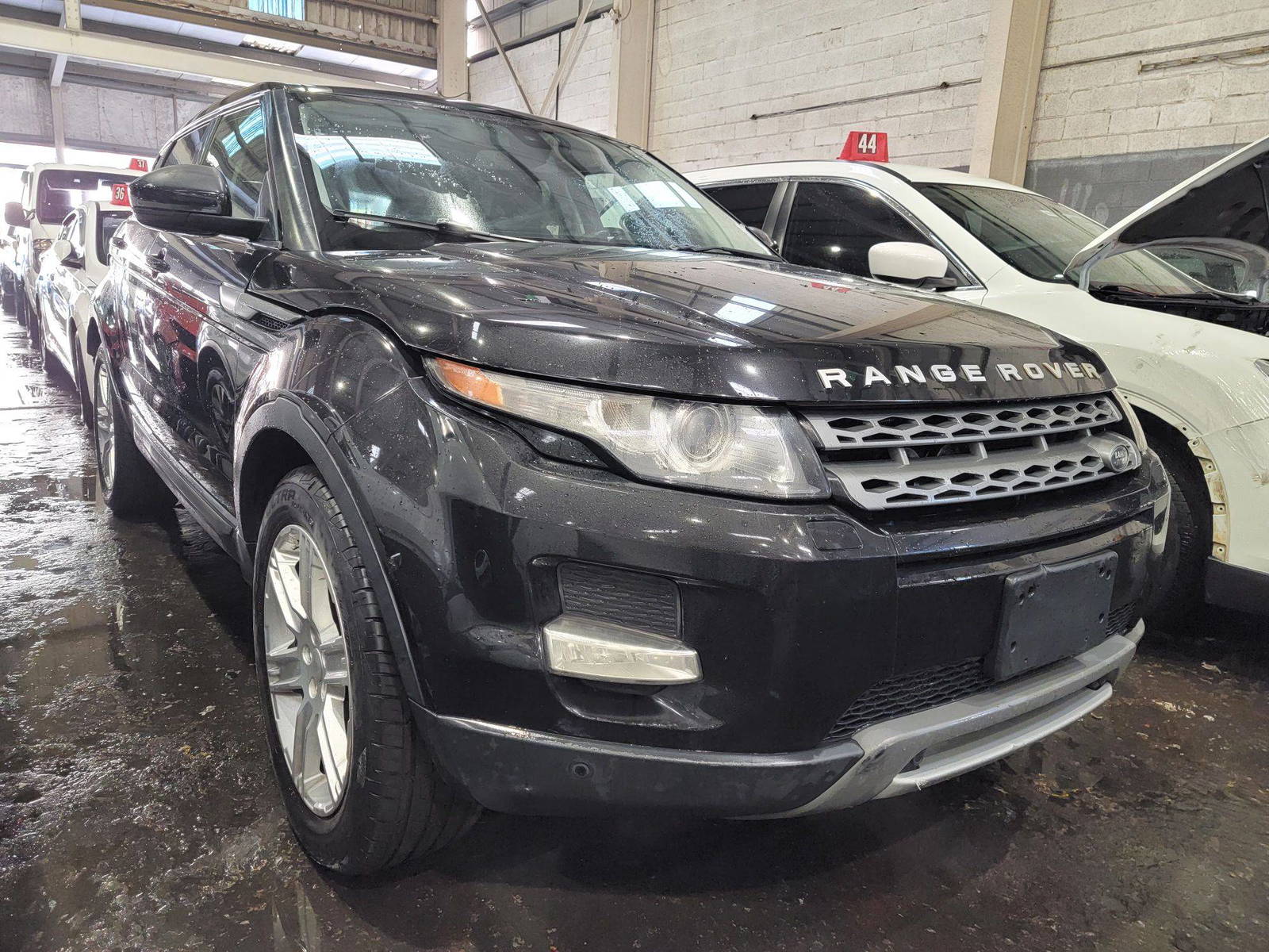 2015 LAND ROVER RANGE ROVER EVOQUE — 109250 Miles — Lot H070219 — Main - Marhaba Auctions Used Cars - Image 4