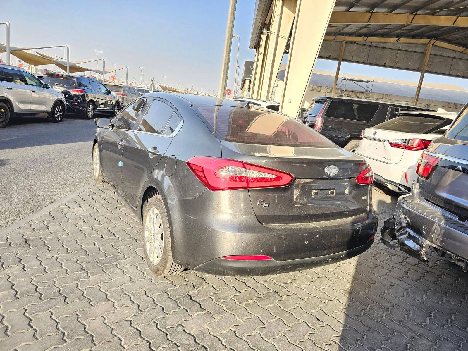 2013 KIA K3 — 126101 KM — Lot BDA127773 — Souq - Marhaba Auctions Used Cars - Image 2