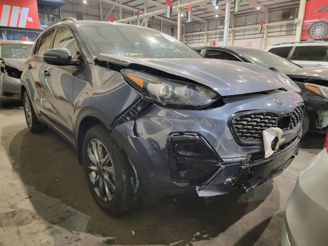 2021 KIA SPORTAGE — 86703 Miles — Lot 42238135 — Souq - Marhaba Auctions Used Cars - Image 4