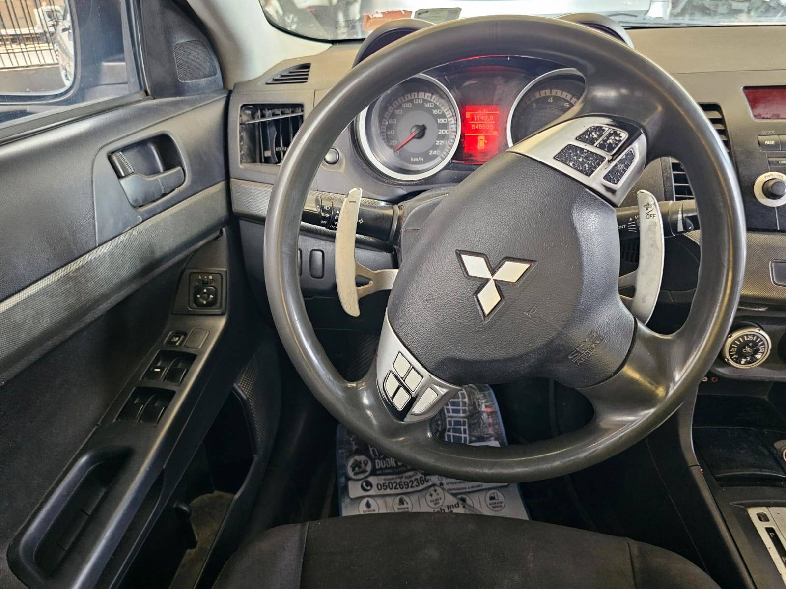2009 MITSUBISHI LANCER — sold — 545599 KM — Lot U724282 — Main - Marhaba Auctions Used Cars - Image 8