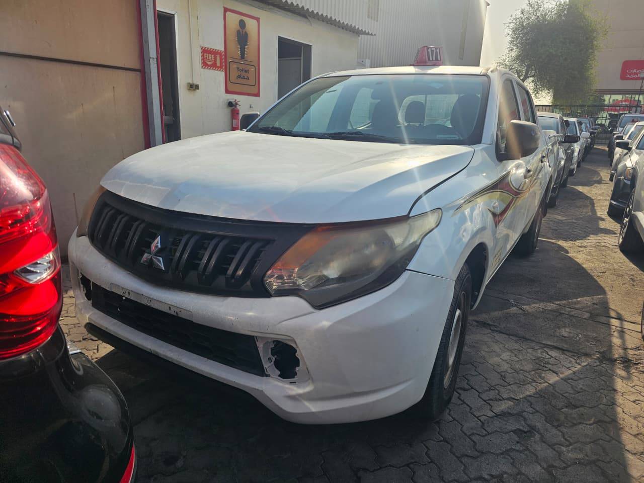 2018 MITSUBISHI pickup — 330053 KM — Lot G35HXJH0284 — Main - Marhaba Auctions Used Cars - Image 3