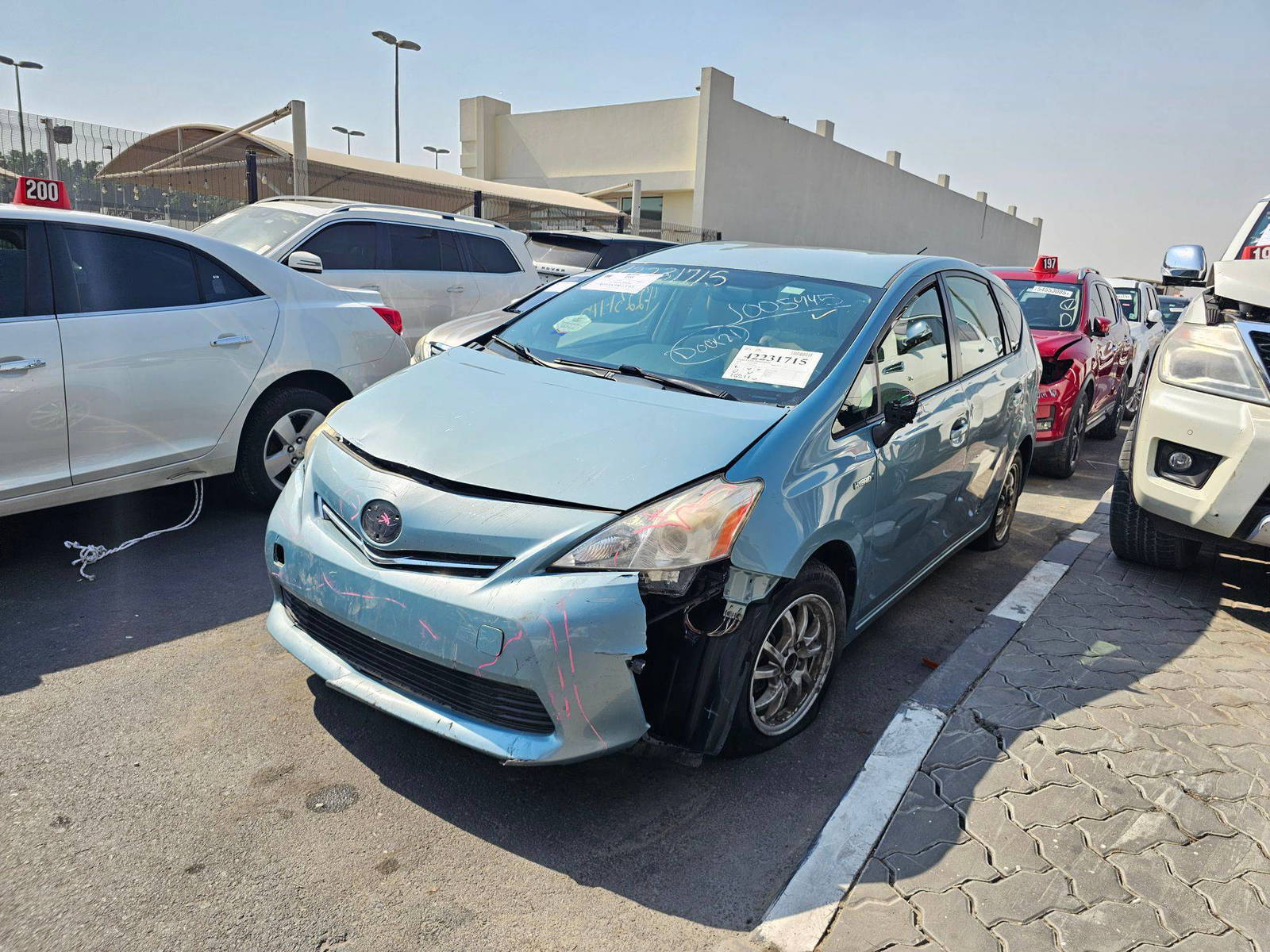 2014 TOYOTA PRIUS V — 182110 Miles — Lot 42231715 — Souq - Marhaba Auctions Used Cars - Image 4