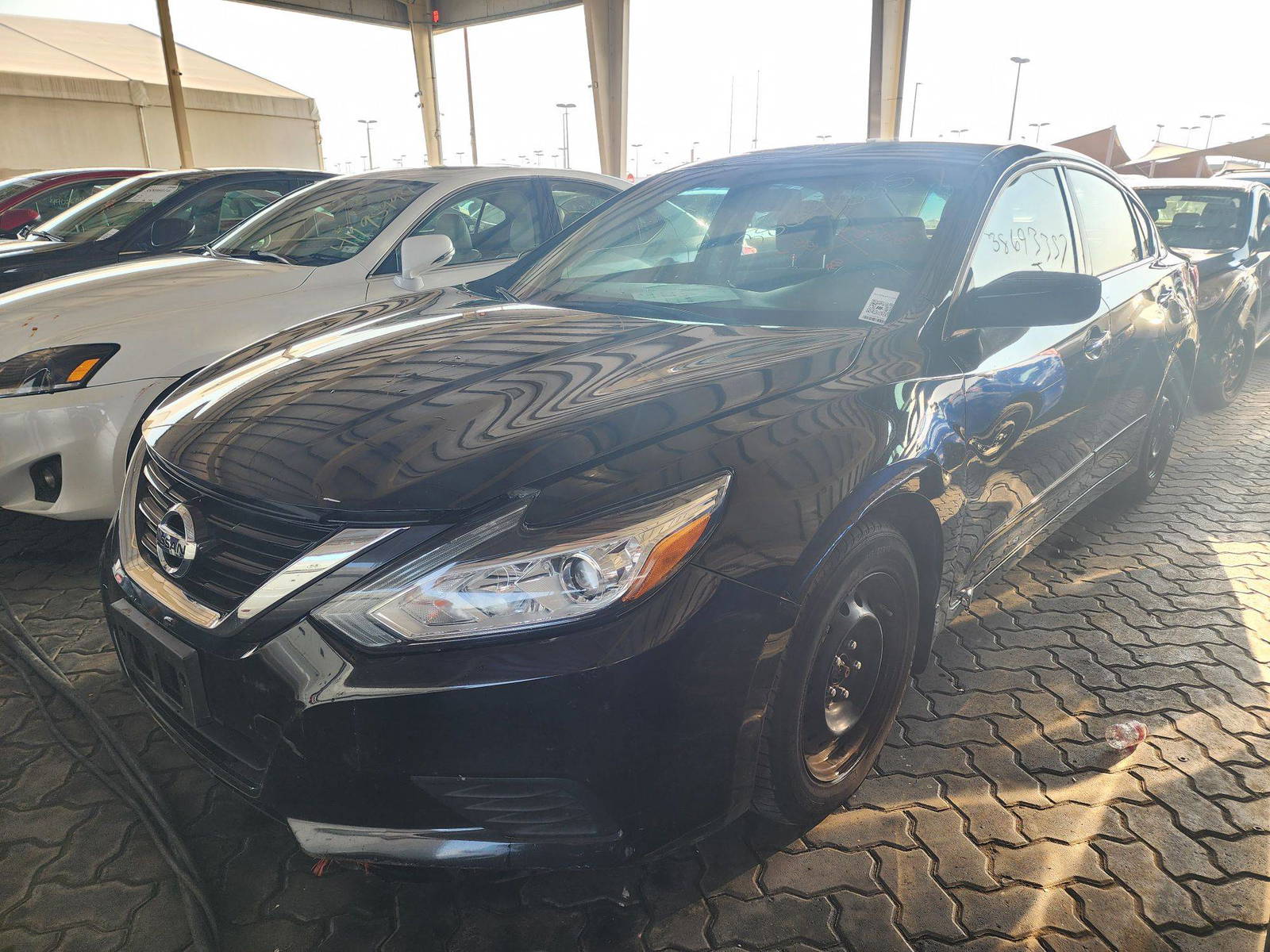2017 NISSAN ALTIMA — 64777 Miles — Lot 38693357 - Marhaba Auctions Used Cars - Image 4