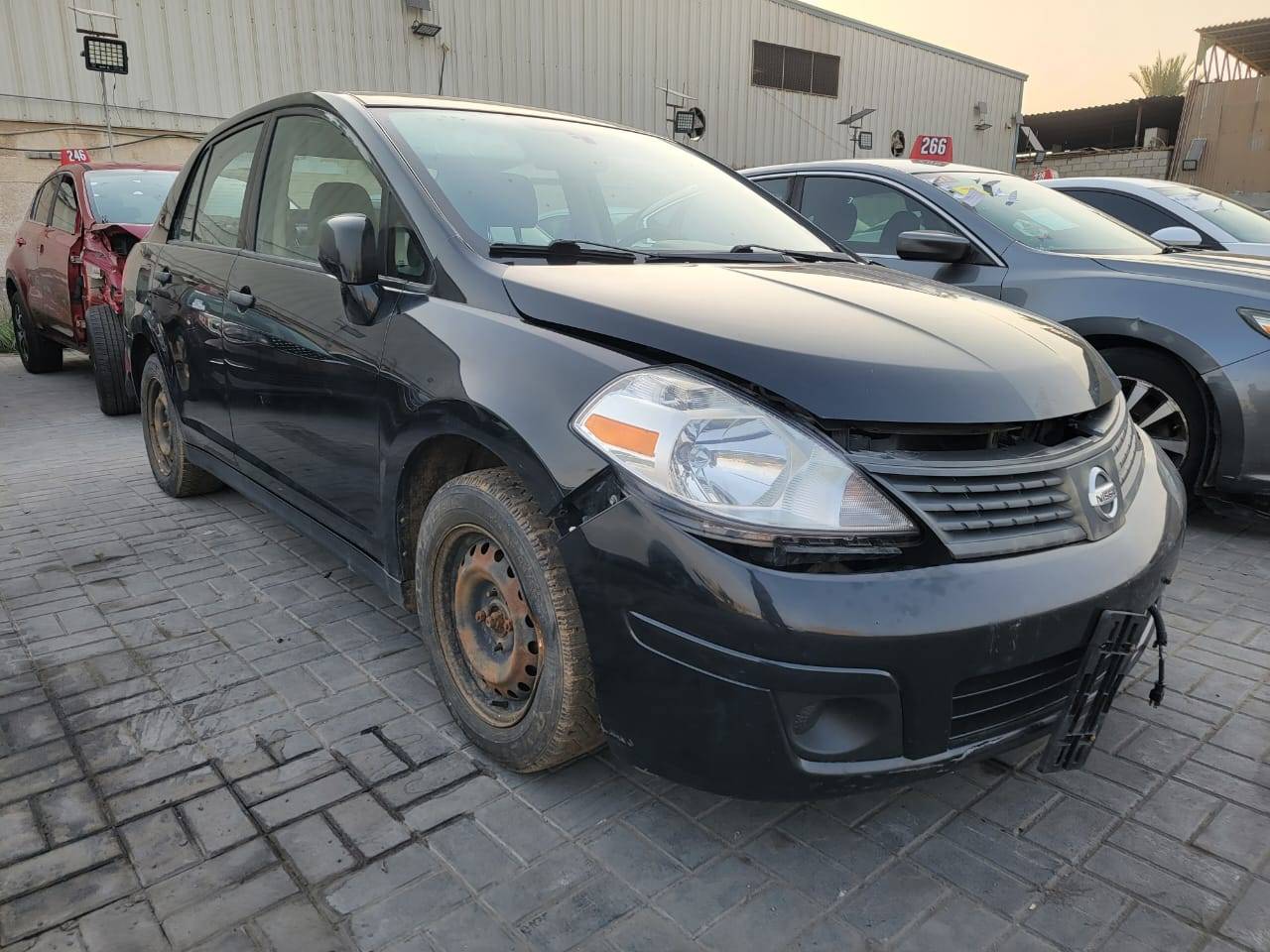 2009 NISSAN VERSA — 193223 KM — Lot E39L435327 — Main - Marhaba Auctions Used Cars - Image 3