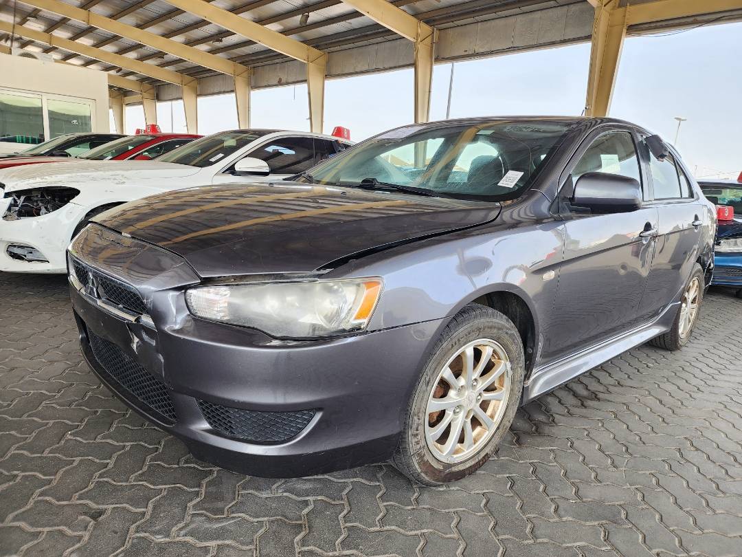 2011 MITSUBISHI Lancer Sportback — 199734 Miles — Lot BU023437 — Souq - Marhaba Auctions Used Cars - Image 3