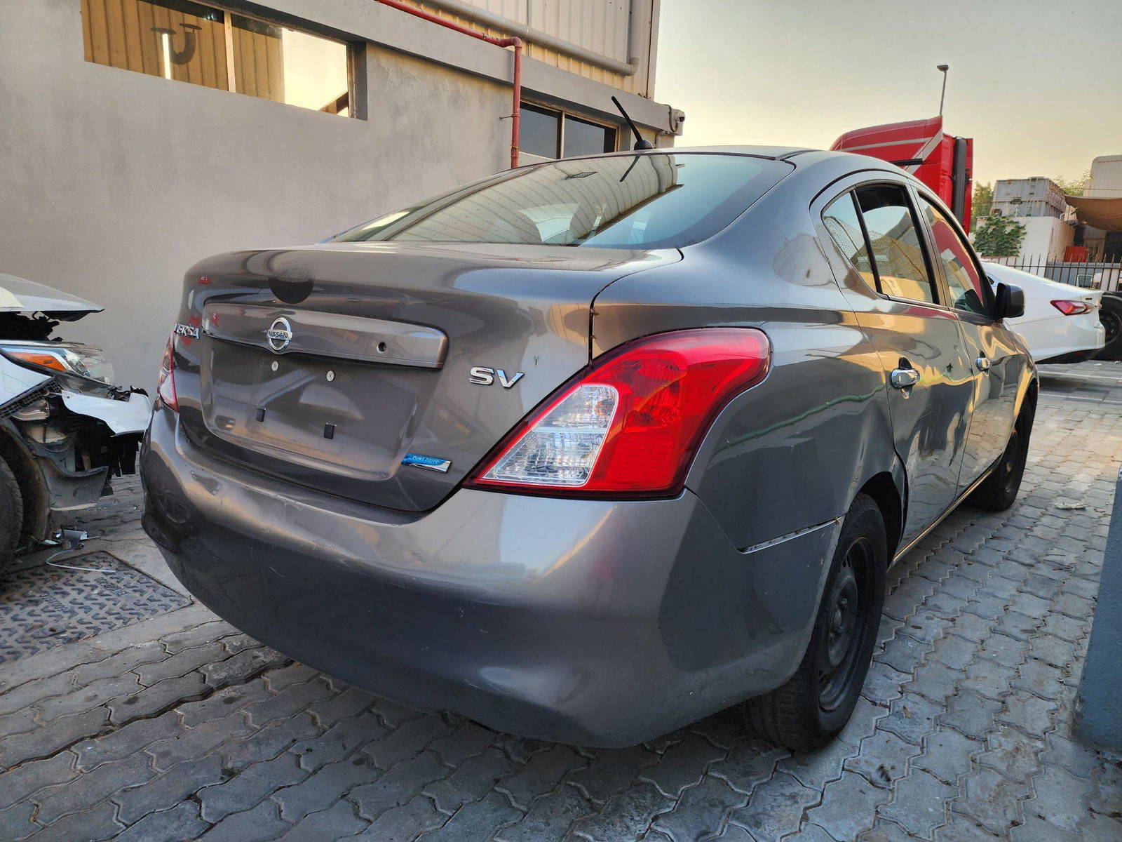 2012 NISSAN VERSA — 176768 Miles — Lot 65241714 — Al Quoz - Marhaba Auctions Used Cars - Image 3