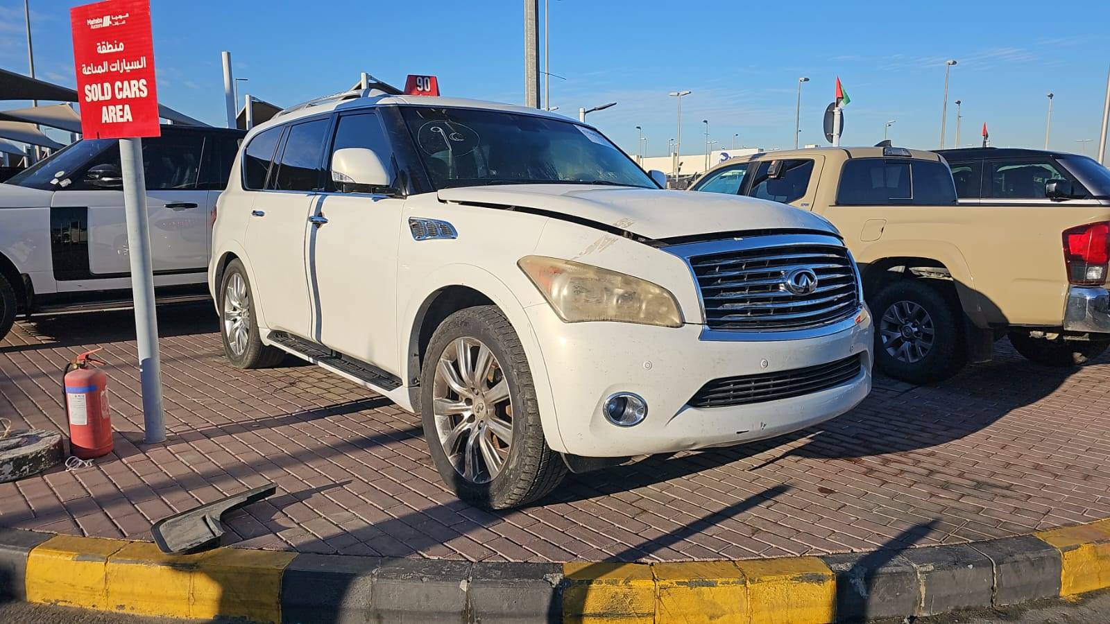 2013 INFINITI QX56 — 234885 Miles — Lot XD9550850 — Souq - Marhaba Auctions Used Cars - Image 11