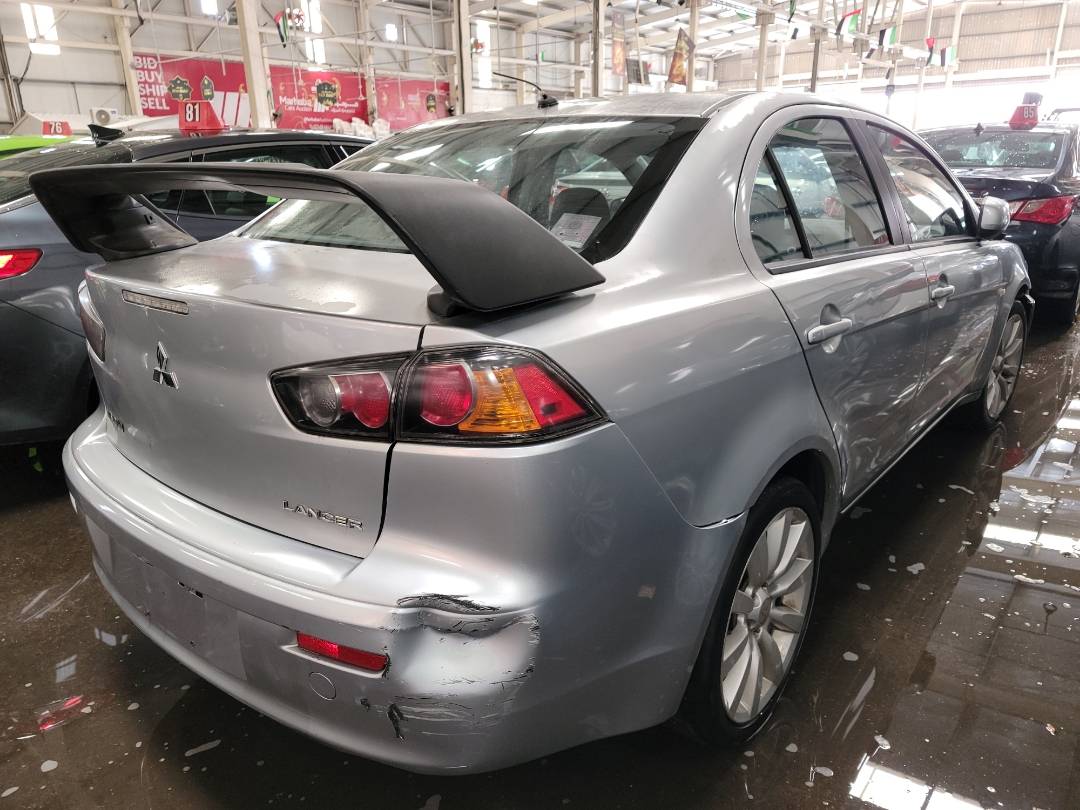 2011 MITSUBISHI LANCER — 106863 Miles — Lot 38329517 - Marhaba Auctions Used Cars - Image 3